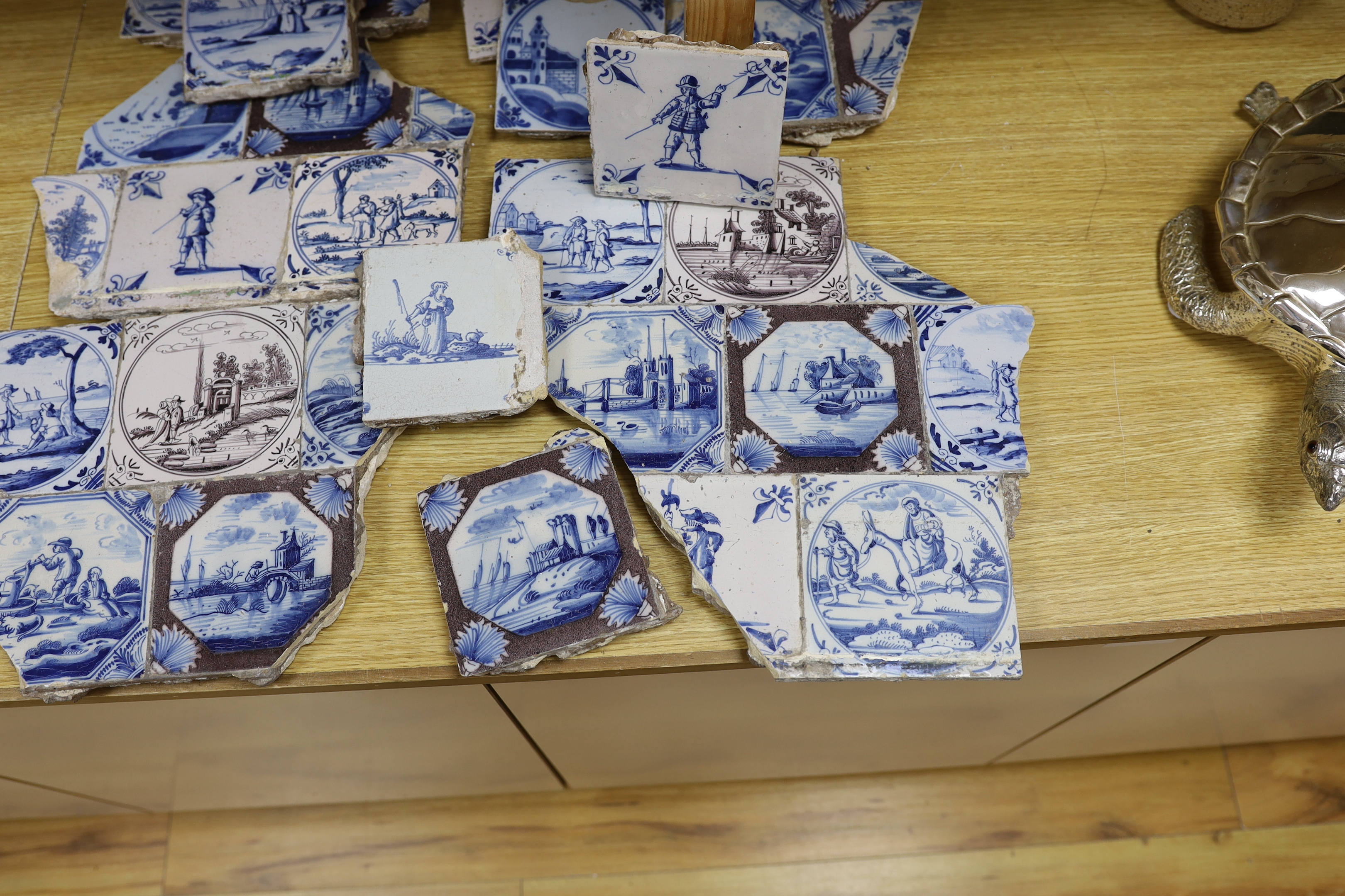 A collection of 18th century Delft Blue and white or manganese tiles (a.f.)